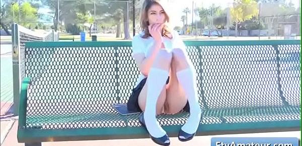  Naughty schoolgirl Kristen get very horny and finger herself deep on the bench outdoor